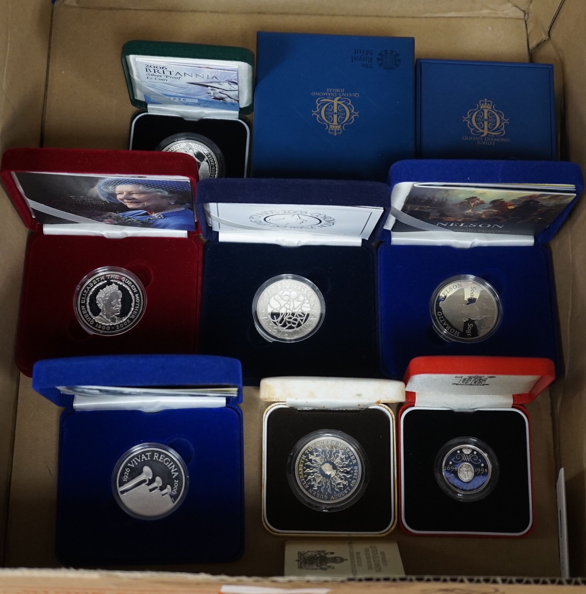 Cased Royal Mint UK silver proof coins – a 2006 1oz. ,Britannia £2, a 2012 QEII Diamond Jubilee £5, 2002 Queen Mother £5, 2003, 2005 and 2006 crowns, a 1980 Queen Mother crown and two piedfort £2 for 1994 and 2004 FIND L